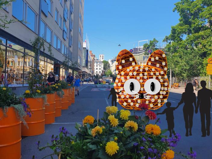 Illustration of the Toivo cat sculpture on summer street. (Picture: Johanna Sinkkonen ja Jone Mutka)